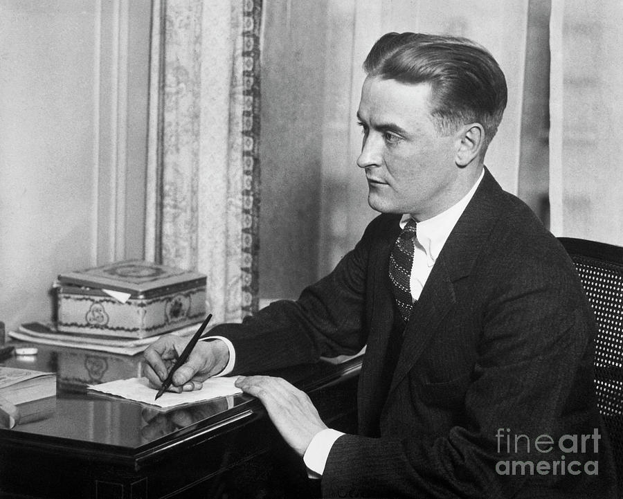 F.scott Fitzgerald Writing At Desk Photograph by Bettmann