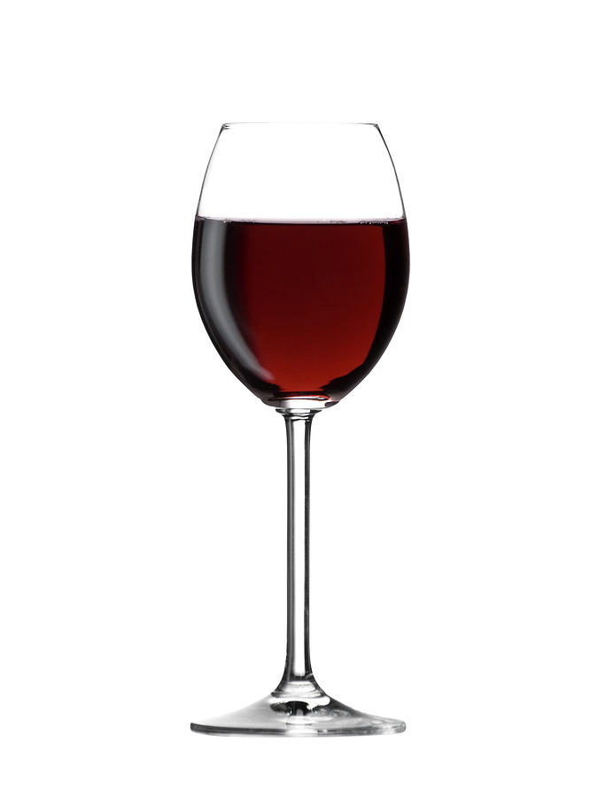 Full Glass Of Red Wine Set Against A Photograph by Micropic
