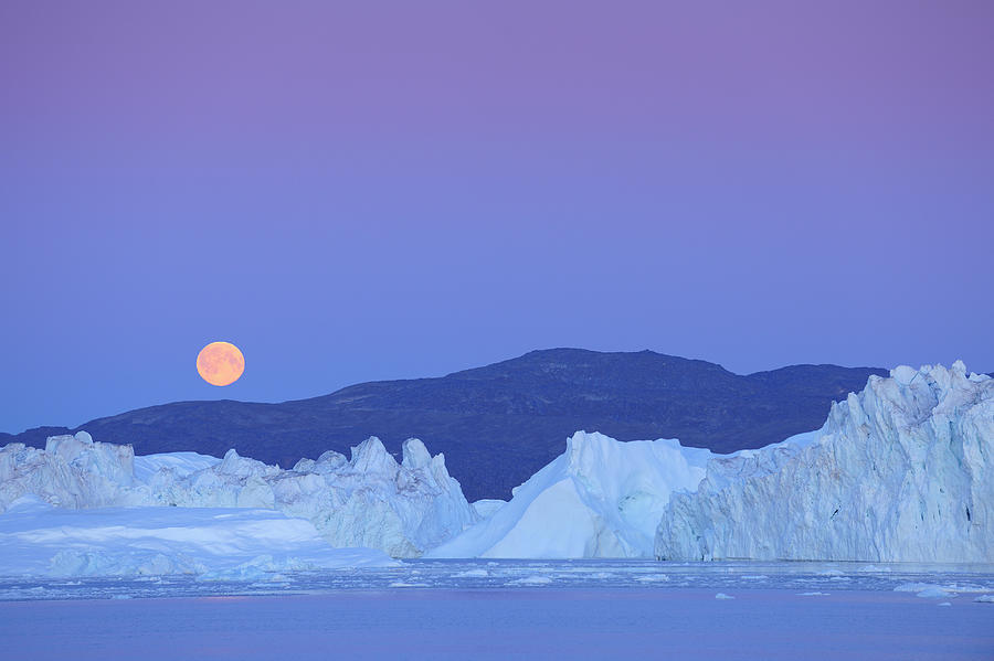 Full Moon Over Iceberg Photograph by Raimund Linke
