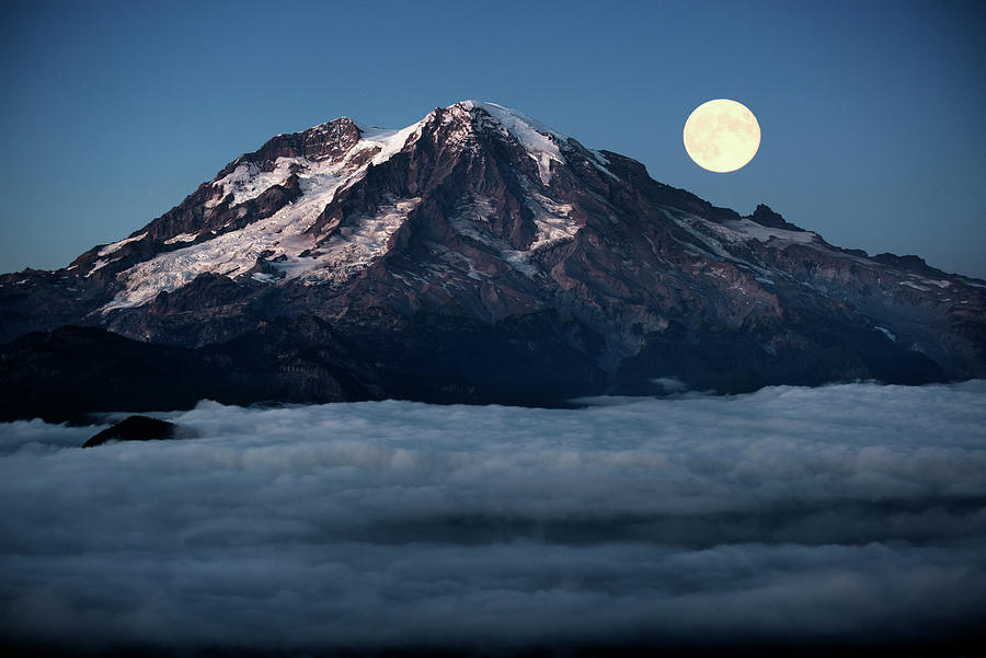 Full Moon Over Mountain Covered With Clouds Photograph by Cavan Images ...