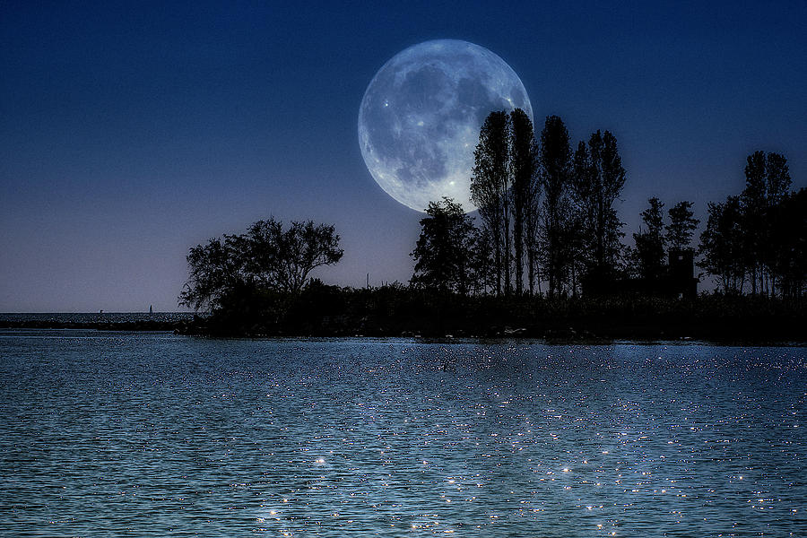Full moon over the island Photograph by Wolfgang Stocker