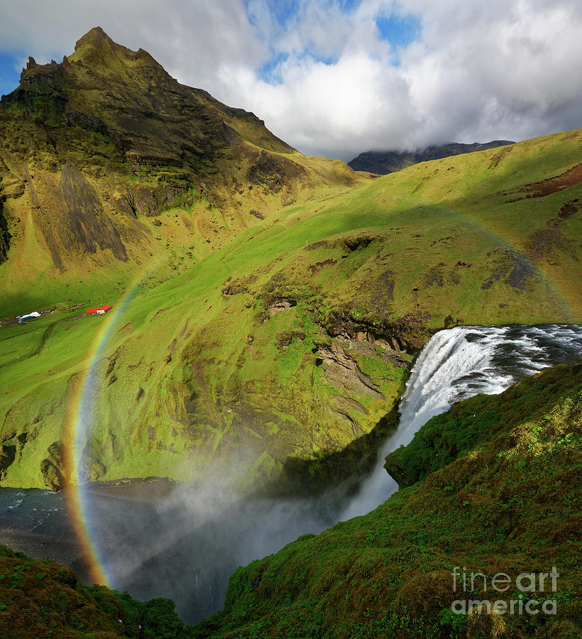 Rainbow over Skogafoss Waterfall in Iceland Photograph by Tom Schwabel
