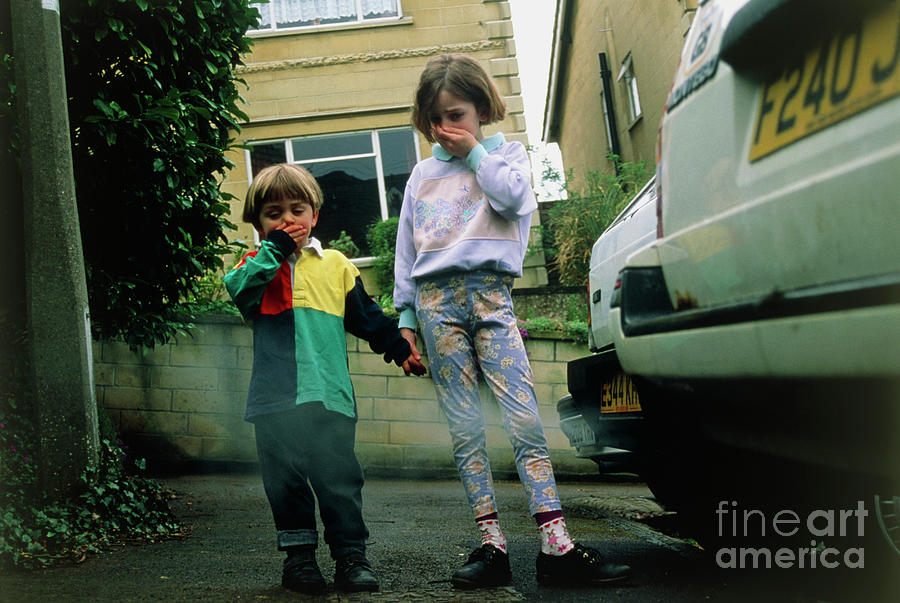 Fumes From Car Exhaust Affect A Young Boy & Girl Photograph by Mark Clarke/science Photo Library