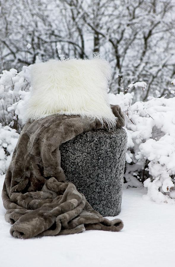 Fur Blanket And Flokati Cushion In Snow Photograph by Annette Nordstrom