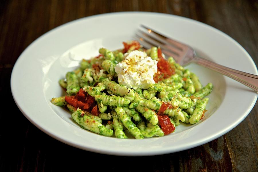 Fusilli Pasta With Pesto, Dried Tomatoes And Ricotta Cheese Photograph by Andre Baranowski