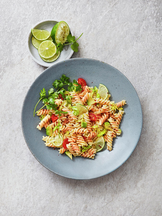 Fusilli With Avocado, Lime, Coriander, Chilli Flakes And Caesar Dressing Photograph by Thorsten Kleine Holthaus