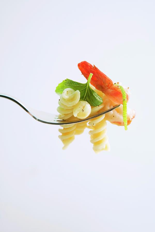 Fusilli With Prosecco Sauce And A Prawn On A Fork Photograph by Michael Wissing