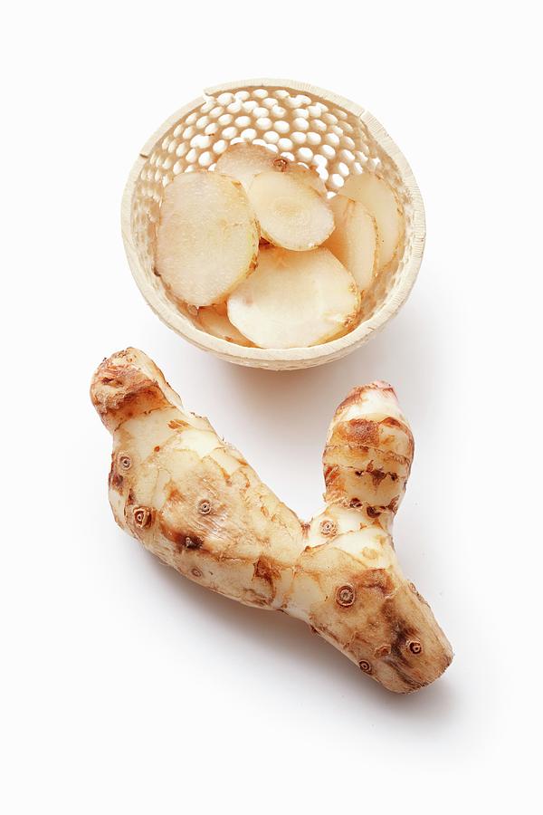 Galangal Root And Slices Photograph by Petr Gross