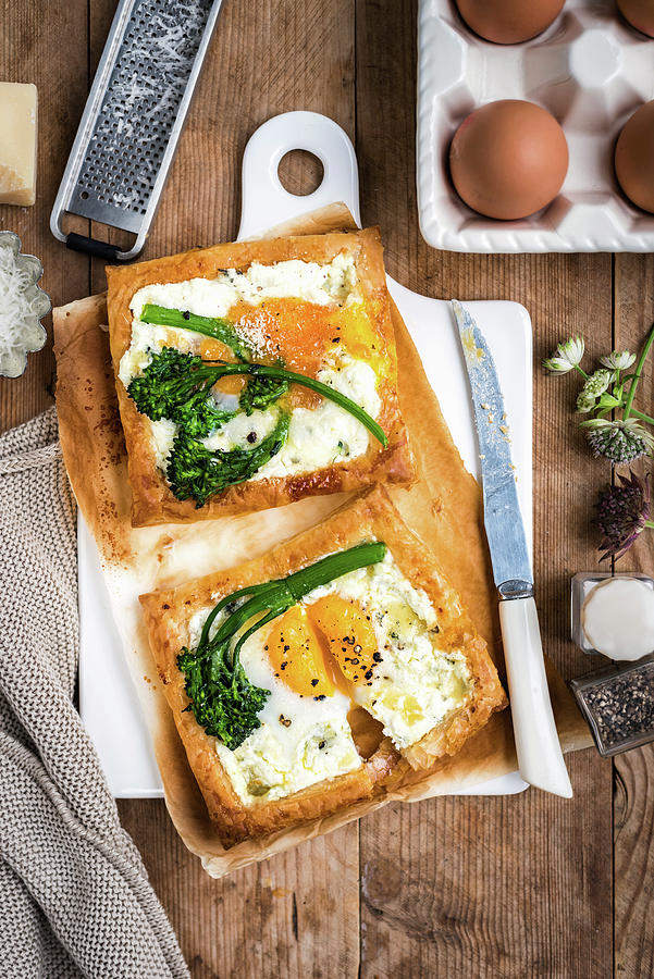 Galettes With Fried Eggs And Broccoli Photograph by Lucy Parissi