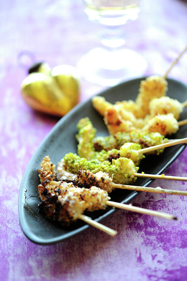 Gambas Trio,coated With Crushed Pistachios,with Almond And With Hazlnuts Photograph by Schmitt