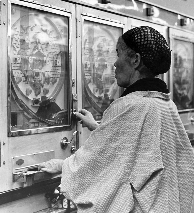 Gambling Granny Photograph by Three Lions Gambling Granny Photograph by Three Lions