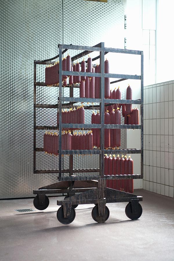 Game Sausage Hanging On A Rack In A Butcher's Photograph by Joerg ...