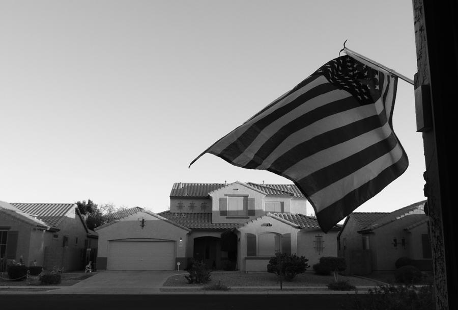 Garage Door Flag Photograph by Bill Tomsa