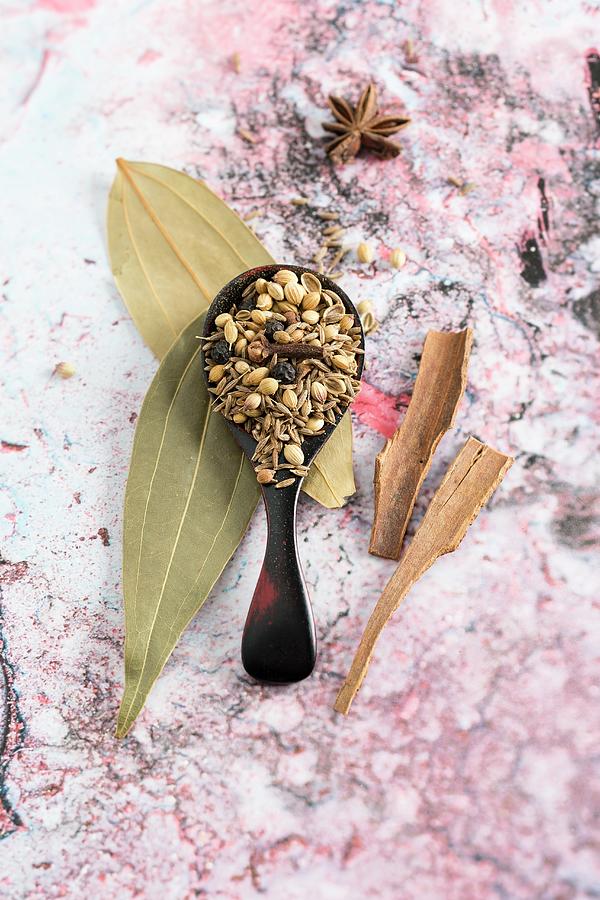Spoon Still Life Photograph - Garam Masala indian Spice Mixture On A Wooden Spoon by Mandy Reschke