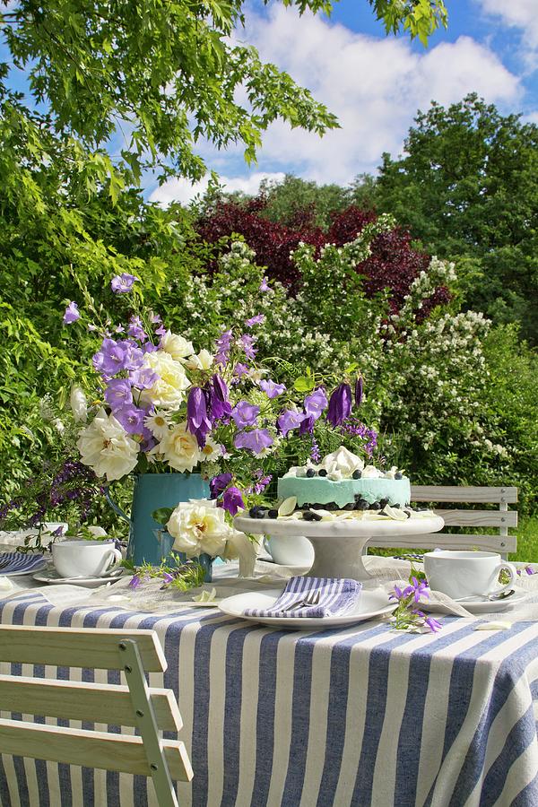 Garden Table Festively Set In Blue And White Photograph by Angela Francisca Endress
