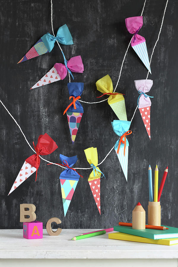 Garland Of Paper Cones For Celebrating First Day Of School Photograph by Thordis Rggeberg