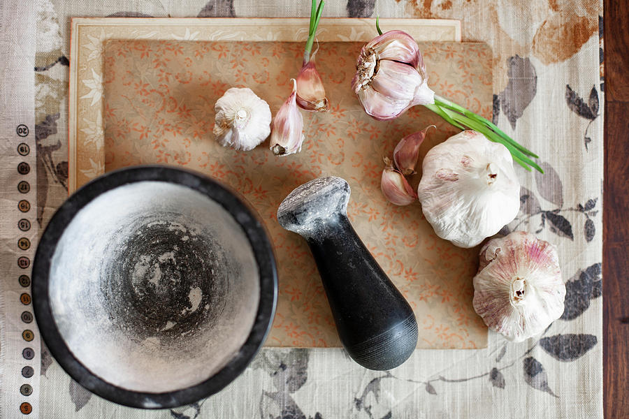 Garlic Bulbs, Garlic Cloves And Mortar And Pestle Photograph by Alicja Koll