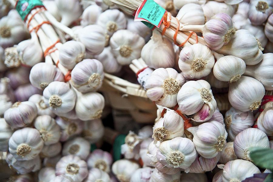Garlic On A Market Stall Photograph by George Blomfield