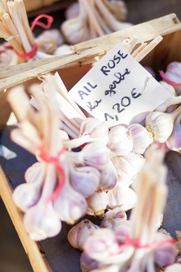 Vegetable Photograph - Garlic On A Market Stall In France by Jalag / Tim Langlotz