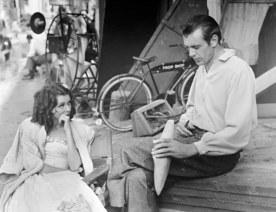GARY COOPER and FRANCES DEE in SOULS AT SEA -1937-. Photograph by Album