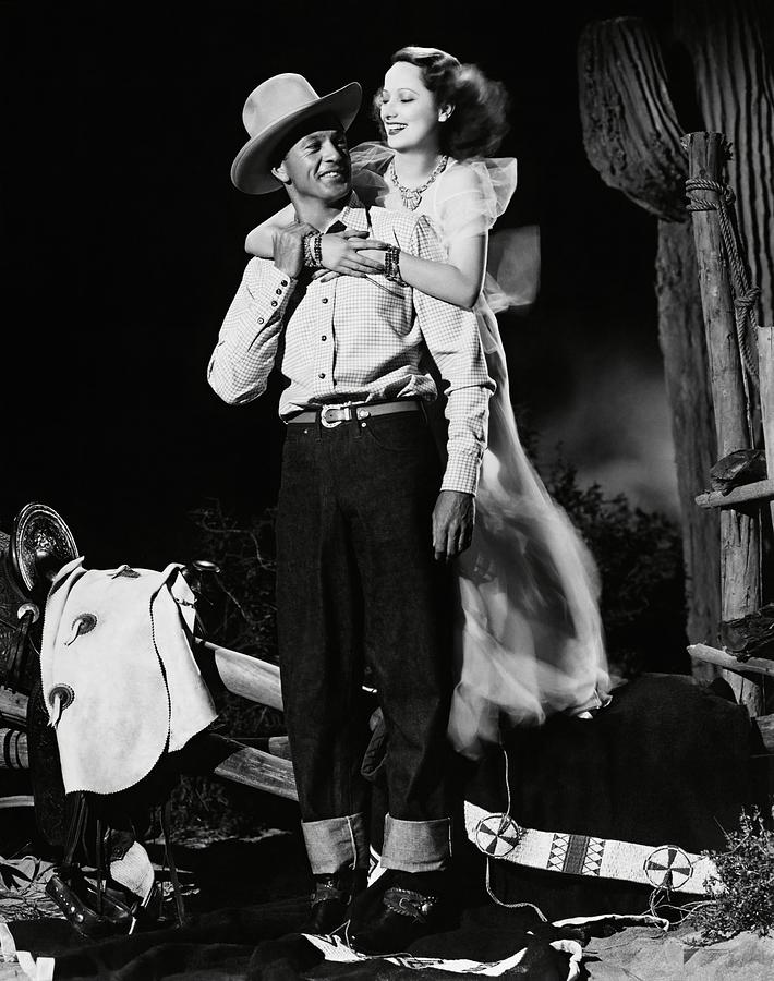 GARY COOPER and MERLE OBERON in THE COWBOY AND THE LADY -1938-. Photograph by Album