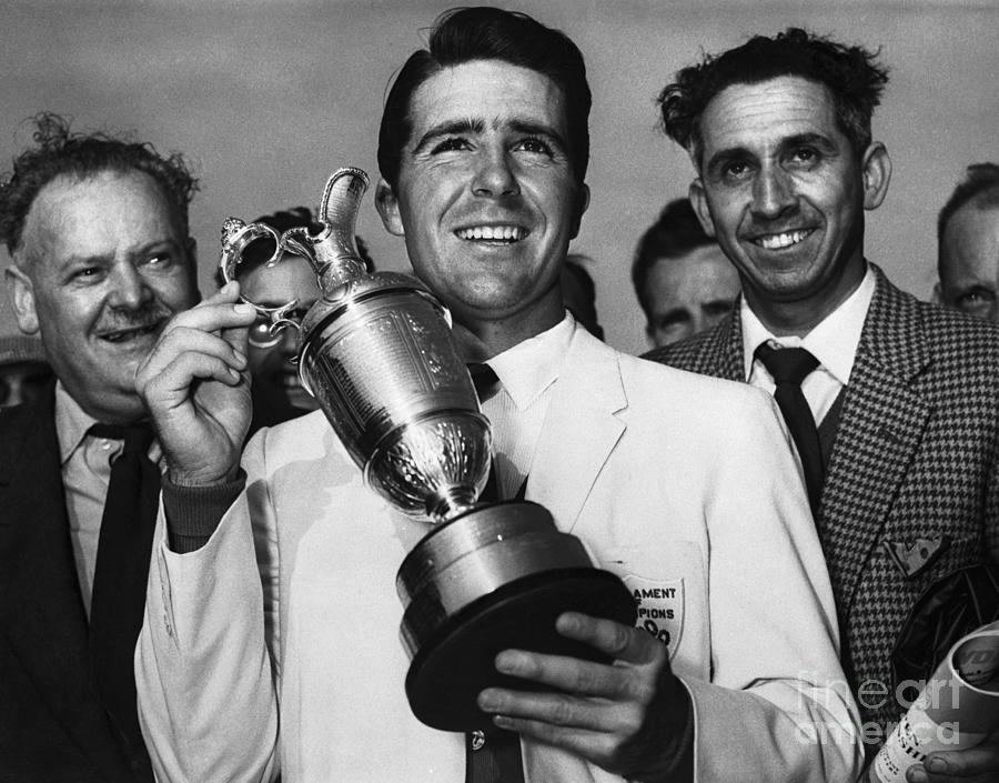 Gary Player Holding Up Golf Trophy Photograph by Bettmann