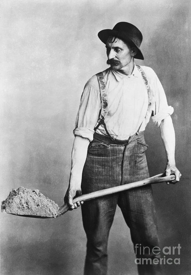 Gas Company Employee Shoveling Dirt Photograph by Bettmann
