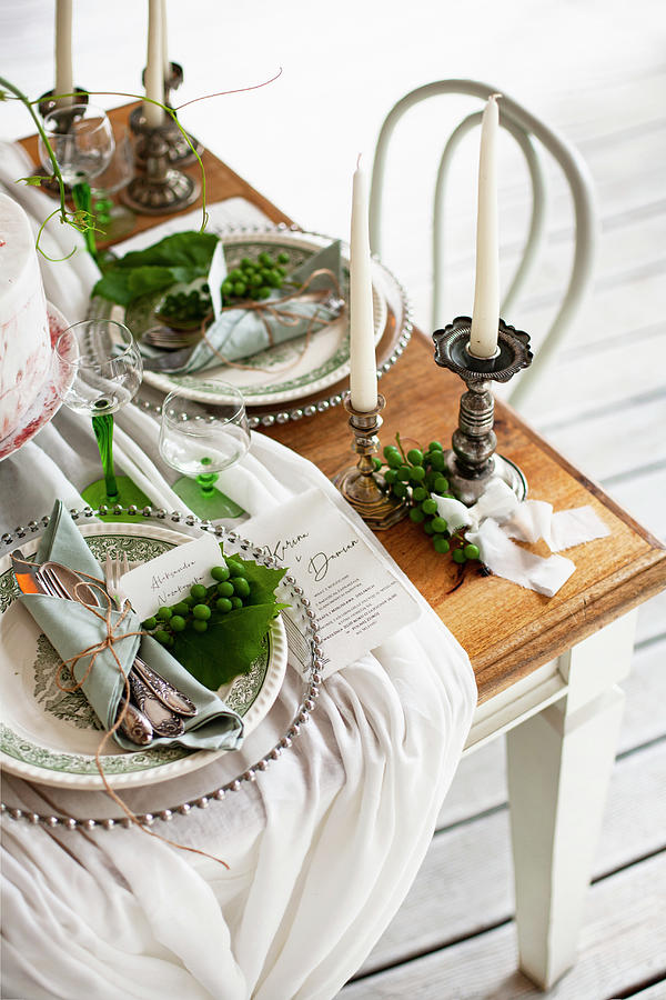 Gathered Tablecloth And Silver Candlesticks On Festively Set Table Photograph by Alicja Koll