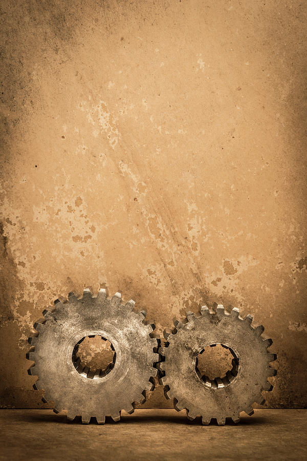 Gears On Textured Paper Photograph by Gary S Chapman