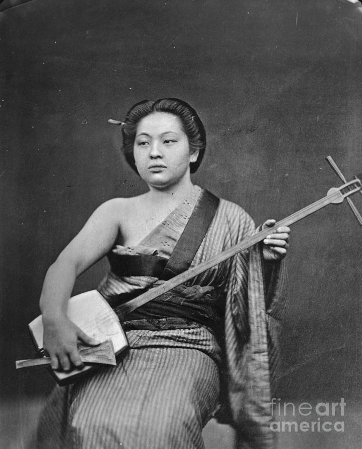 Geisha Girl Playing Samisen Photograph by Bettmann