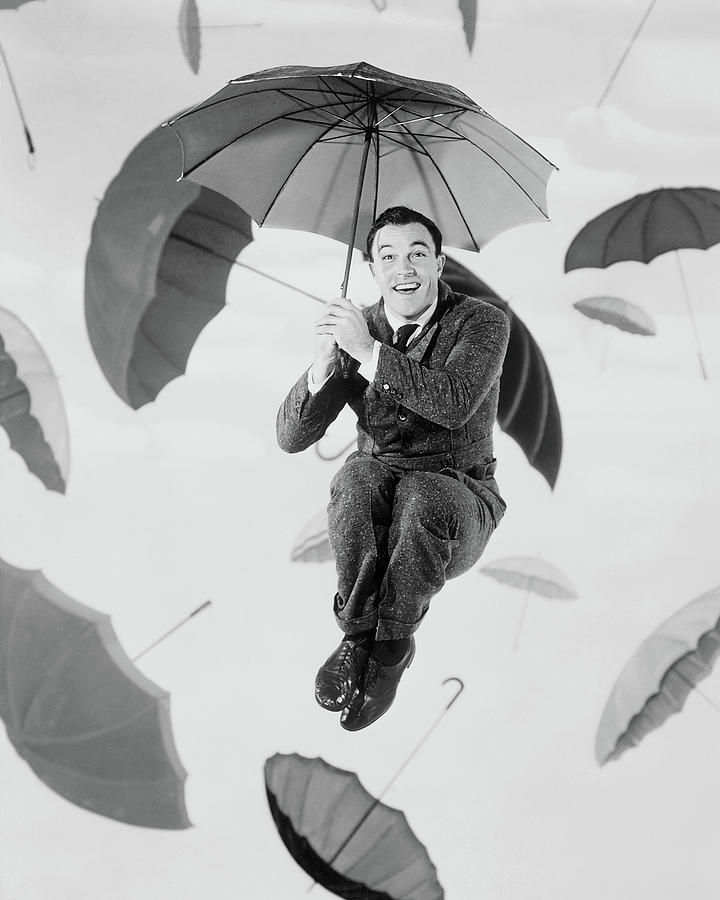 Gene Kelly Photograph - Gene Kelly Singin In The Rain II by Globe Photos