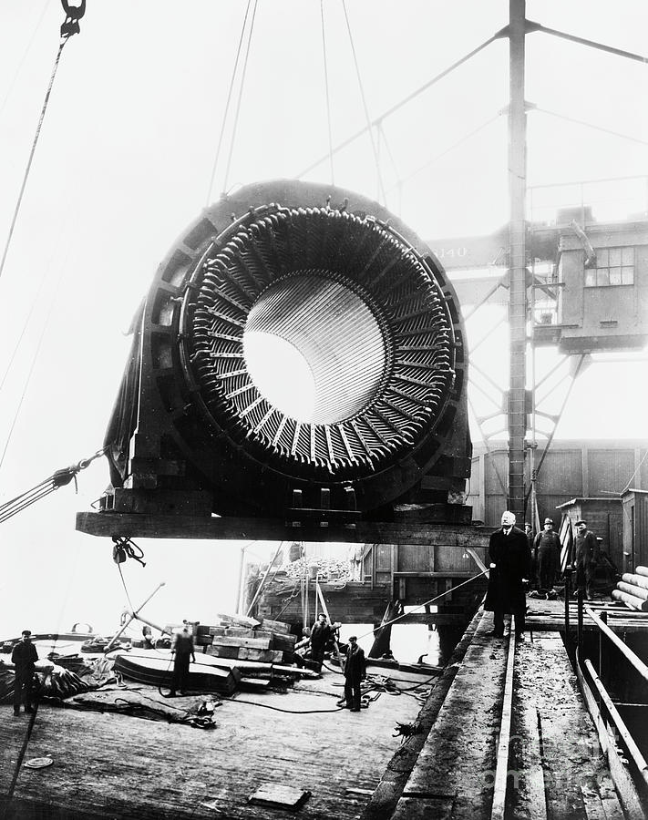 Generator Hoisted By Crane Photograph by Bettmann