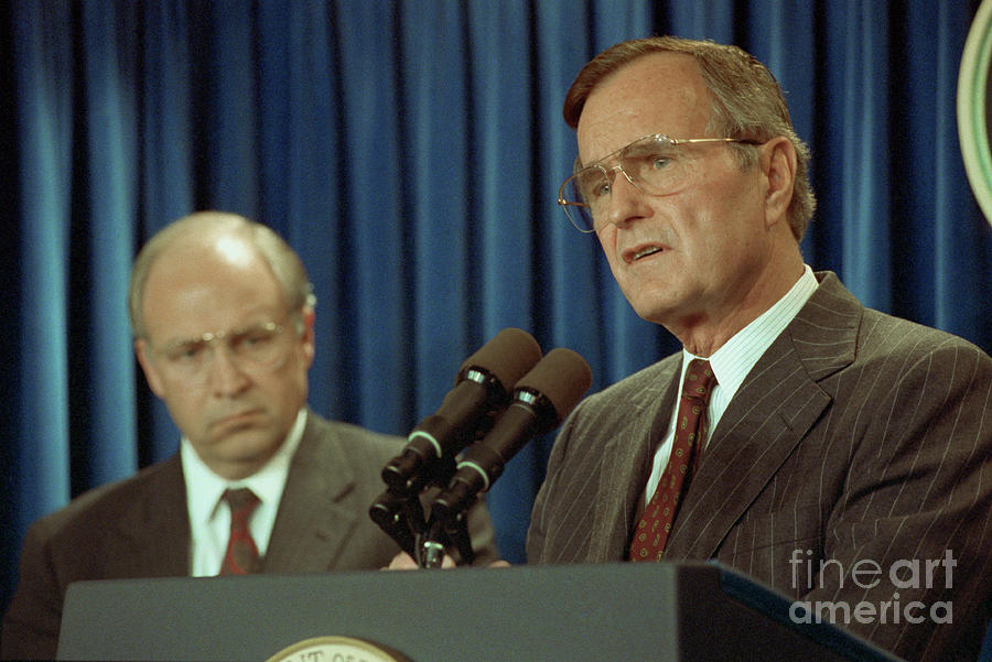 George Bush And Dick Cheney Giving by Bettmann