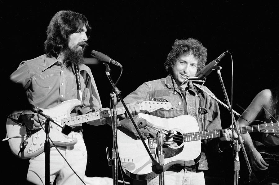 George Harrison & Bob Dylan Perform In Concert Photograph by Bill Ray