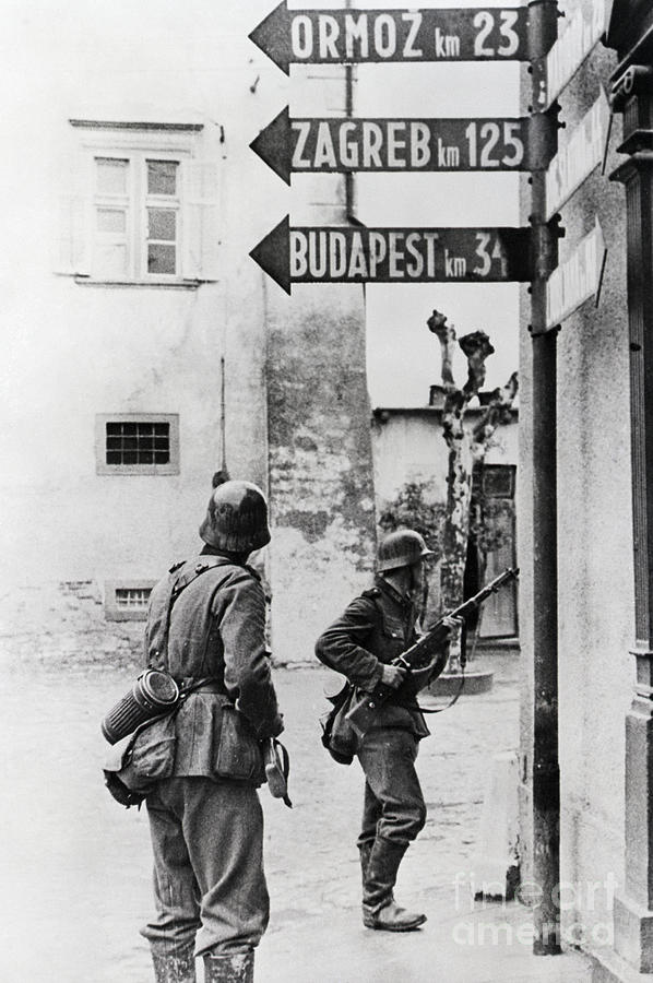 German Infantry In Yugoslav Town Photograph by Bettmann