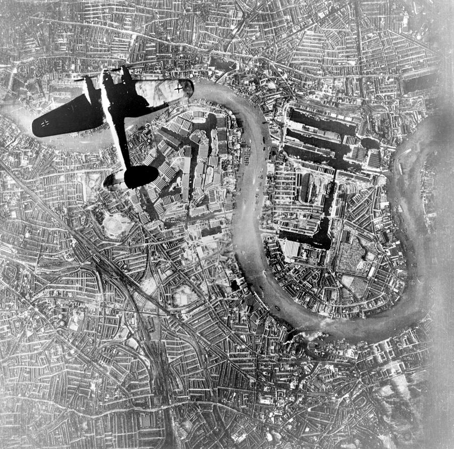 Nature Painting - German Luftwaffe Heinkel He 111 bomber flying over Wapping and the Isle of Dogs in the East End of L by Celestial Images