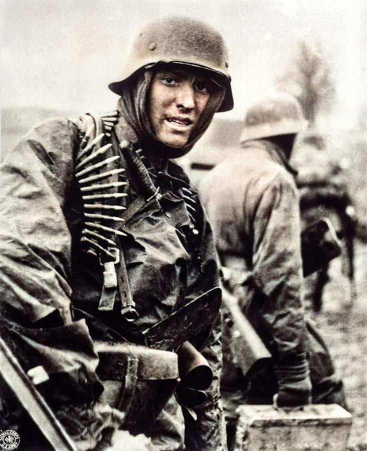 German machine gunner marching through the Ardennes in the Battle of the Bulge colorized Painting by Celestial Images
