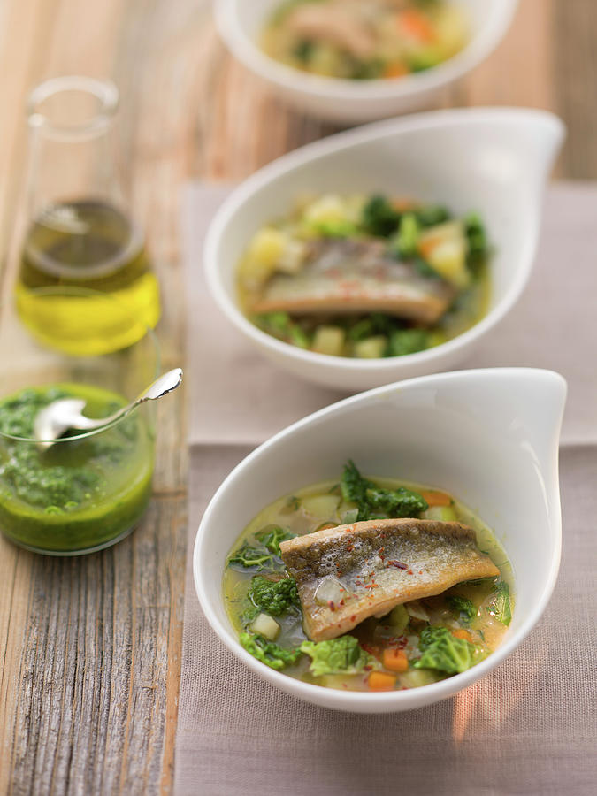 German Pichelsteiner Stew With Trout And Lovage Pesto Photograph by Eising Studio