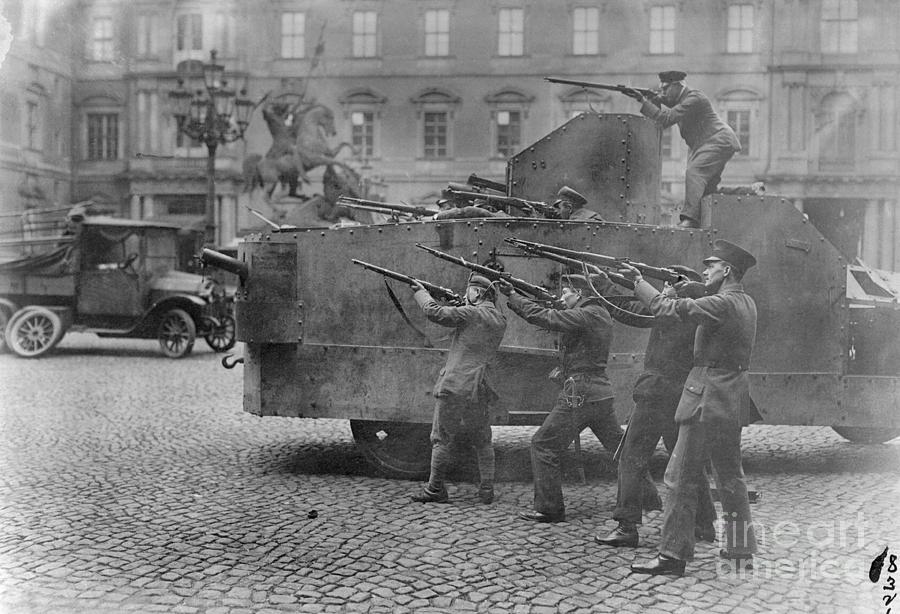 German Soldiers Aiming Weapons In Street Photograph by Bettmann