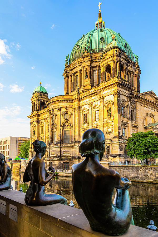 Germany, Berlin, Berlin Mitte, Berlin Cathedral, Berlin Cathedral On Spree River With Three Girls And A Boy Sculptures In The Foreground Digital Art by Kav Dadfar