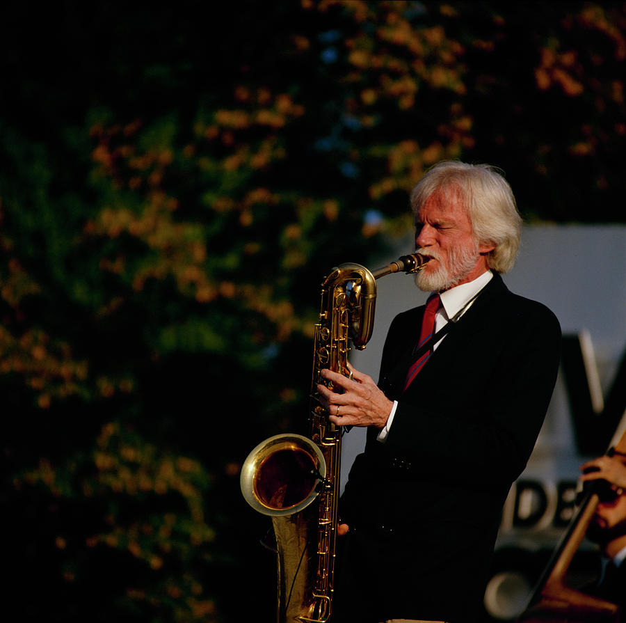 Gerry Mulligan Performs On Stage Photograph by David Redfern