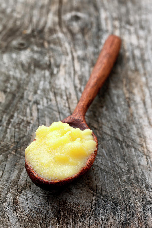 Ghee On A Wooden Spoon Photograph by Petr Gross