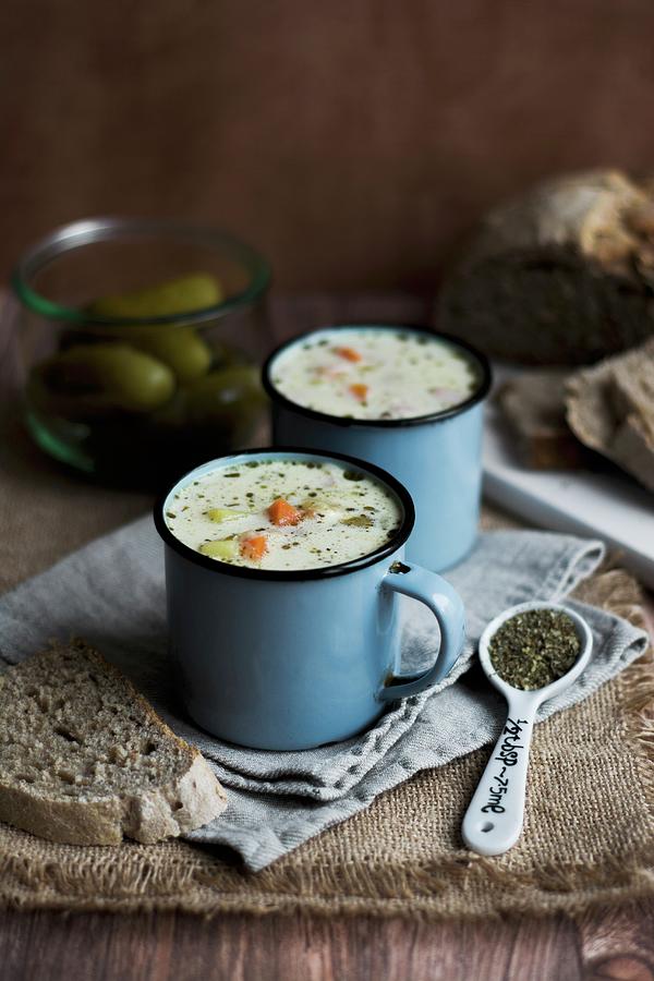 Gherkin Soup In Enamel Mugs Photograph by Adriana Baran