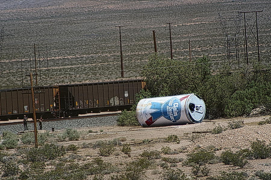 Giant Beer Can in Nevada Desert near Train Tracks Photograph by Colleen Cornelius