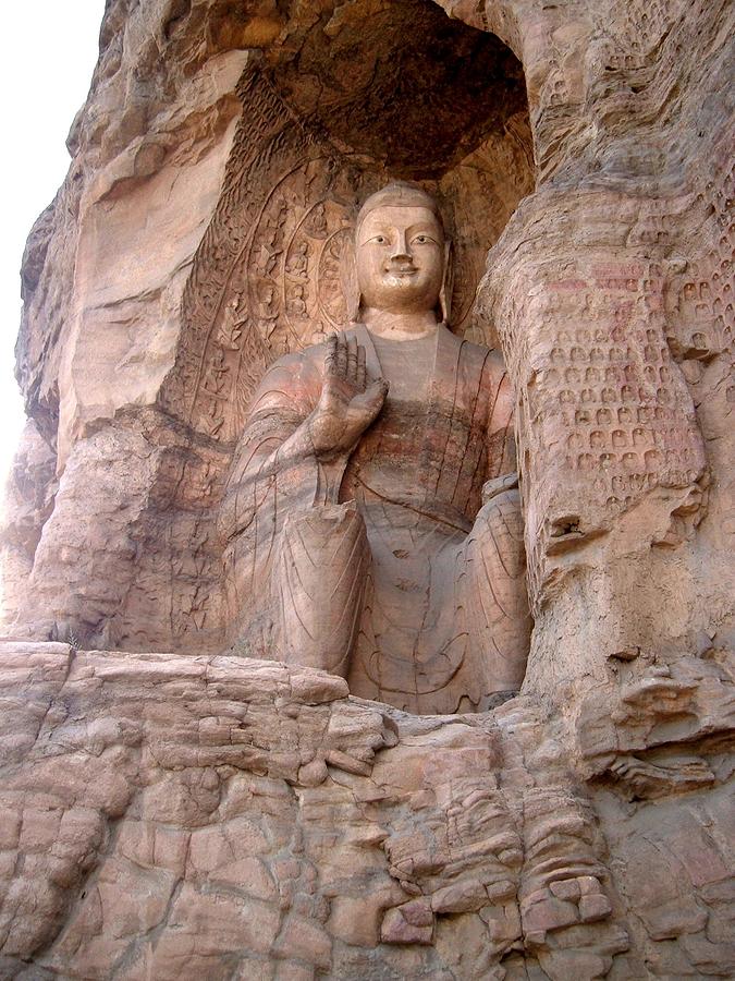 Giant Buddha carved in mountain side Photograph by Kaye Terrelonge - Pixels