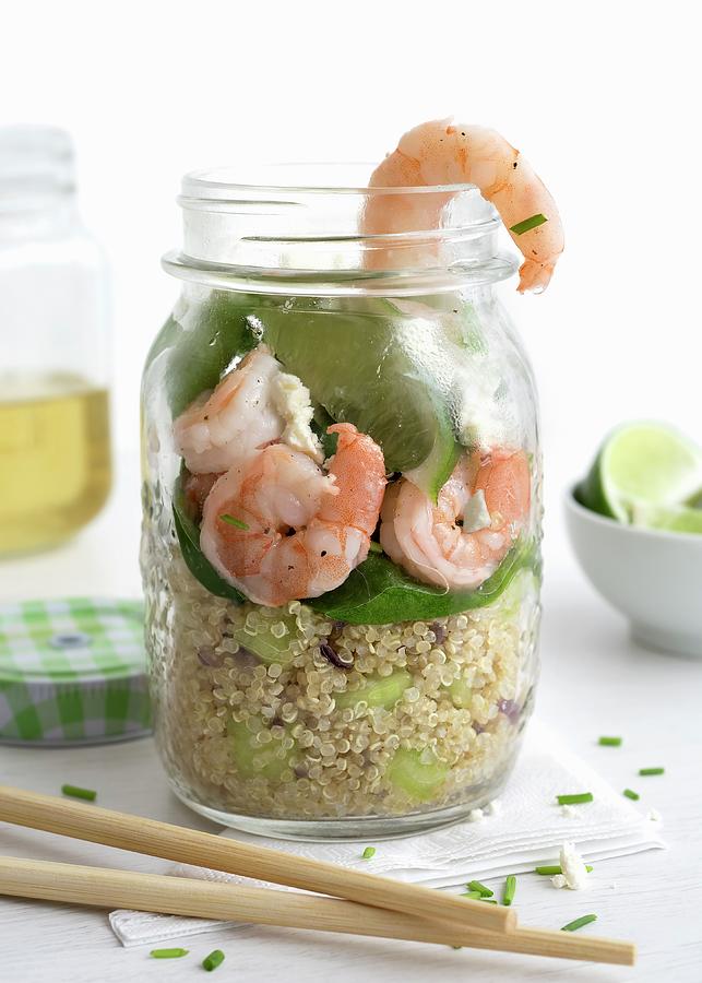 Giant Prawns And Quinoa In A Glass With Lime And Baby Spinach Photograph by Etienne Voss