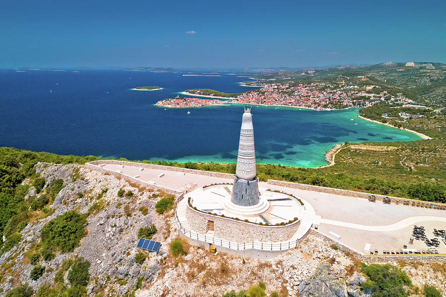 Giant Virgin Mary statue on hill above Primosten aerial view Photograph by Brch Photography