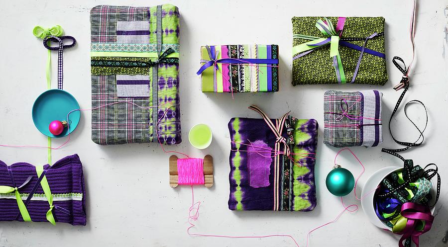 Gift-wrap Ideas Using Fabrics And Ribbons Photograph by Andreas Hoernisch