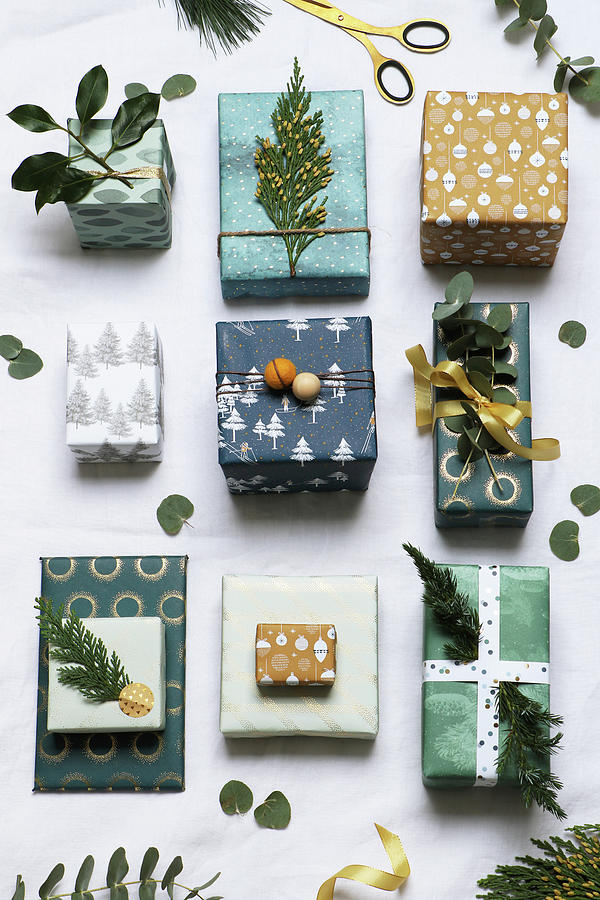 Gifts Festively Wrapped In Shades Of Green And Decorated With Twigs Photograph by Marij Hessel