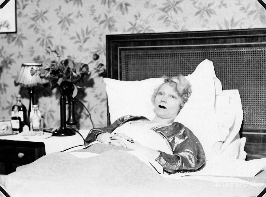 Gilda Gray - sick in bed - 1932 Photograph by Sad Hill - Bizarre Los Angeles Archive